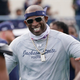 Jackson State football coach Deion Sanders greets his defensive squad after they recovered a Mississippi Valley State fumble for a touchdown in March, 2021.